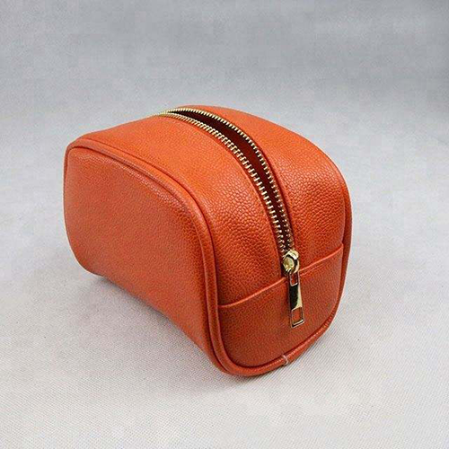 orange PU leather cosmetic organizer with compartments for travel storage